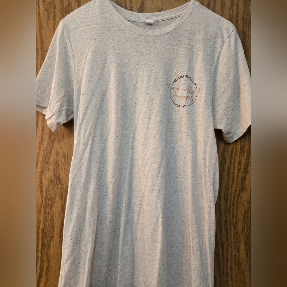 Texas Aggie short sleeve, light tan graphic t shirt. Size small. Never worn.